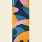 Colorful yoga mat with abstract design on a beige background - Splobby 